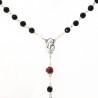 Satin pouch with coral rose and black pearl rosary